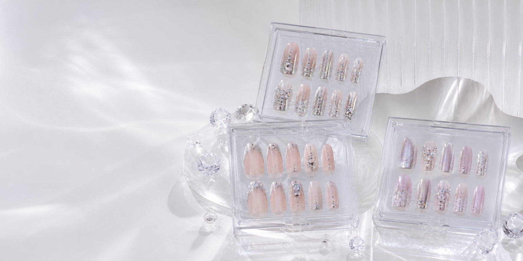 Crystal press-on nail sets in clear cases