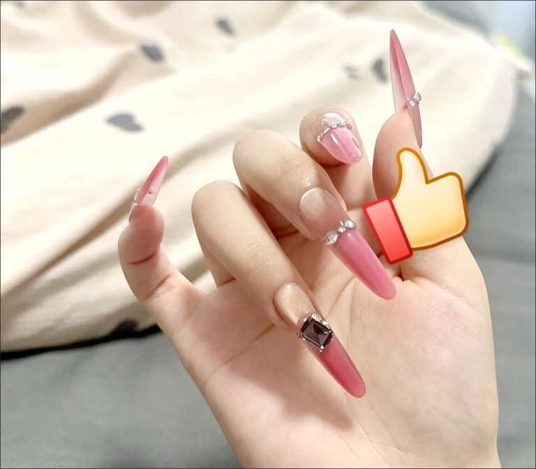 Review photo for Burgundy Cat Eye Long Stiletto Press-On Nails