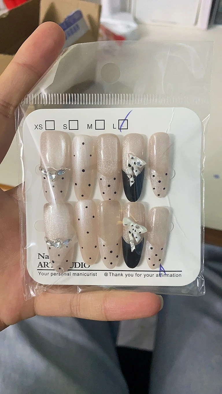 Review photo for Black & White Polka Dot Bow Long Press-On Nails