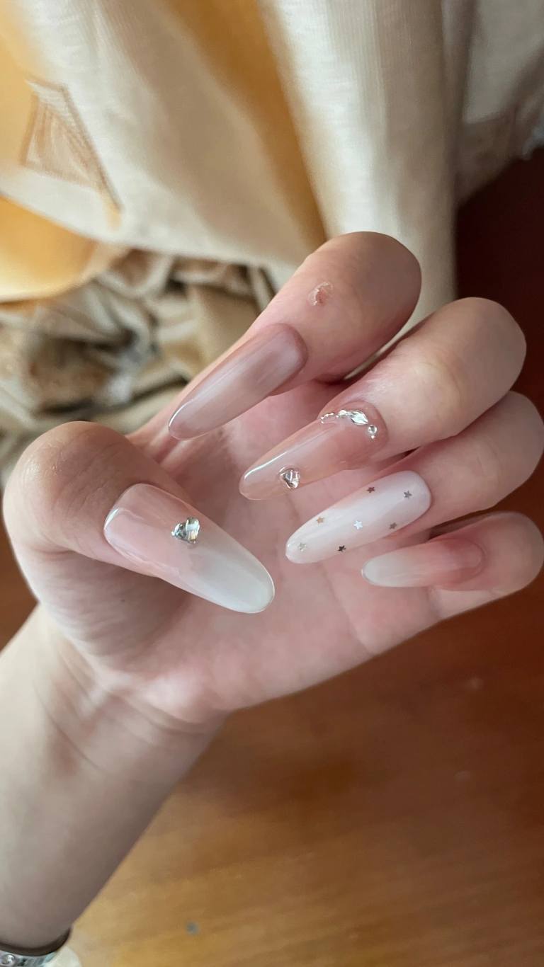 Review photo for Pink & Blue Star Cat Eye Medium-Length Press-On Nails