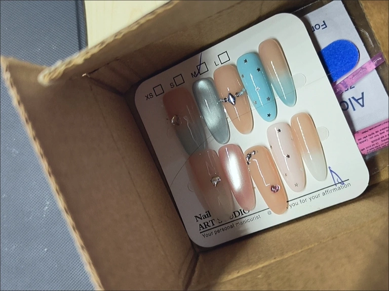 Review photo for Pink & Blue Star Cat Eye Medium-Length Press-On Nails