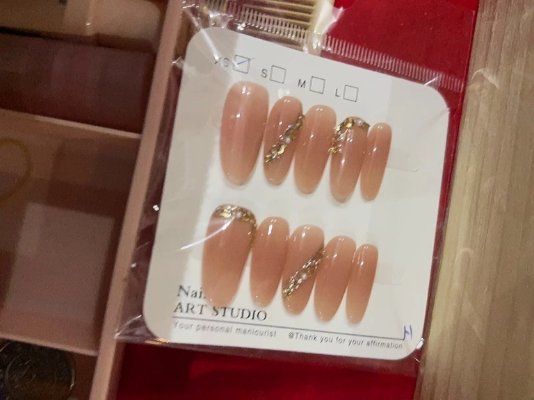 Review photo for Nude Rhinestone Short Almond Press-On Nails