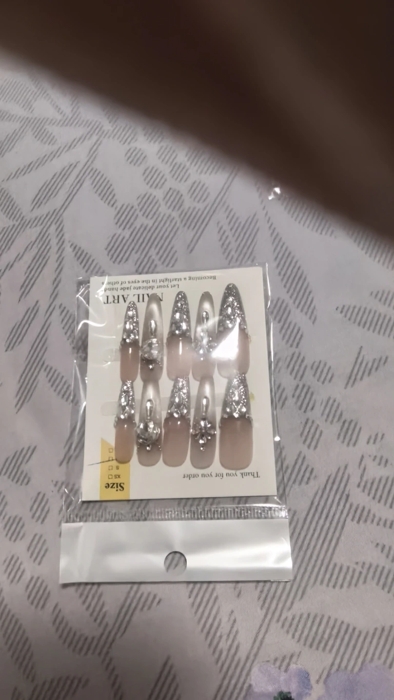 Review photo for Silver Glitter Long Stiletto Press-On Nails